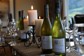 Two bottles of local New Zealand wine on a table ready for tasting.